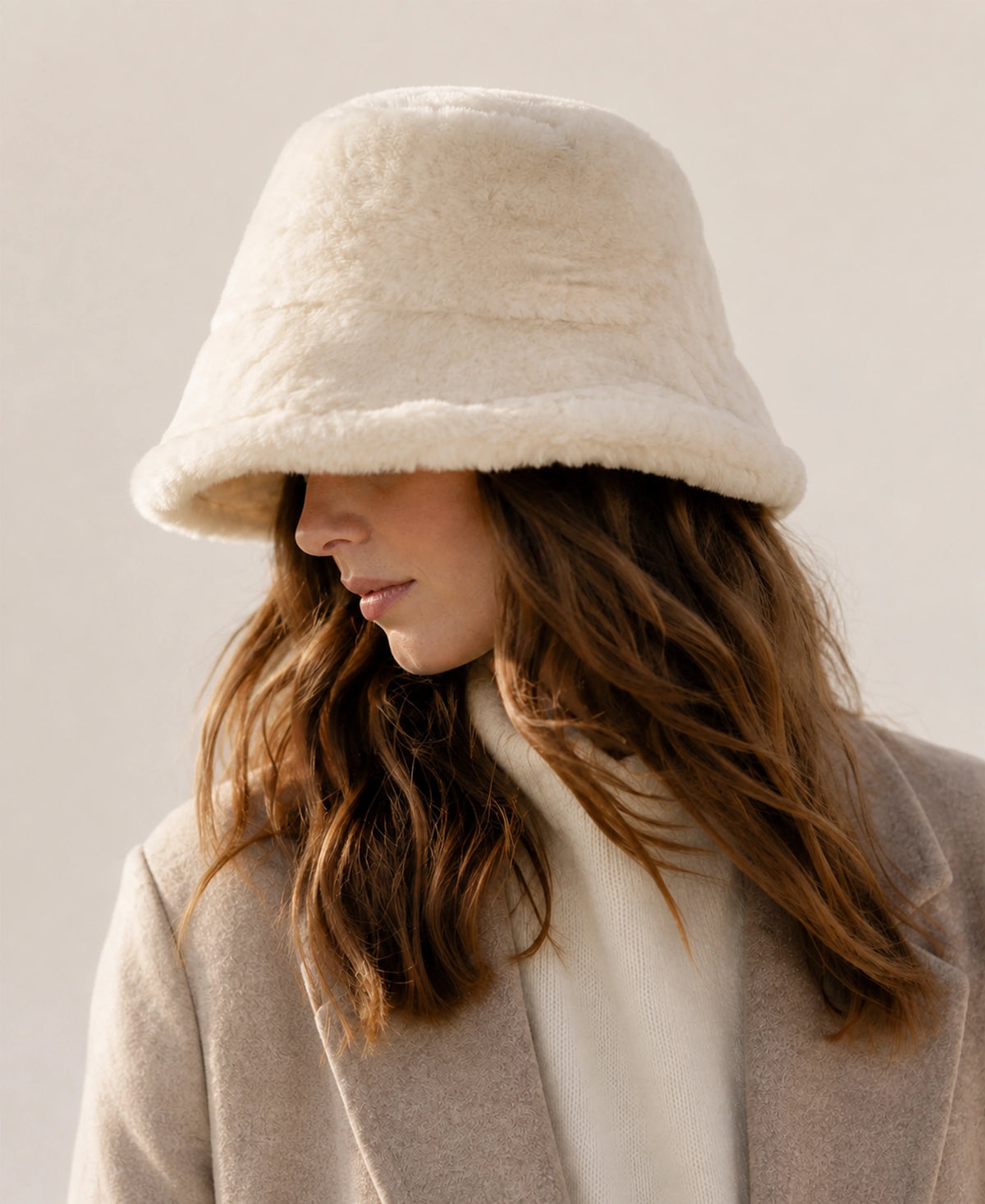 Unisex Genuine Leather Rounded-Crown Short-Brim Bucket Hat – Color: Off-White on-model lifestyle image