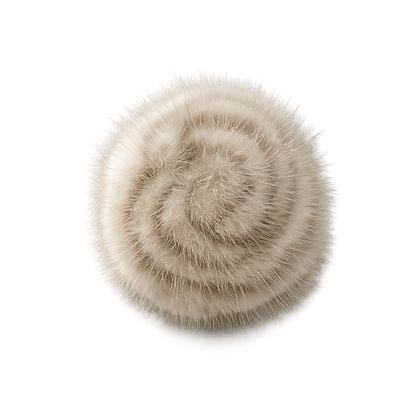 Beige camellia flower brooch on a clean neutral background