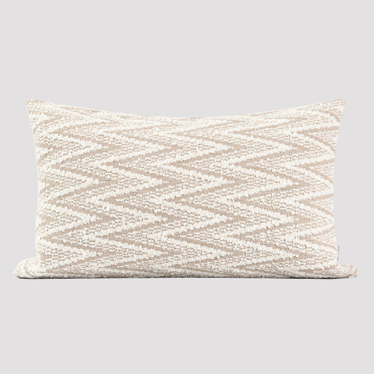 Beige lumbar herringbone cushion