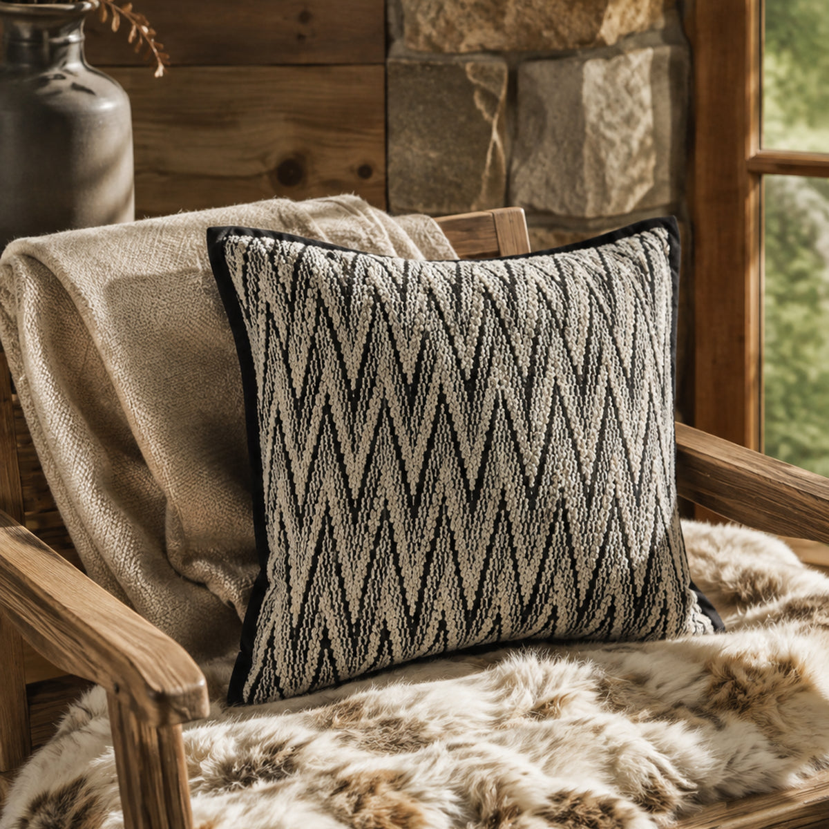 Black and white herringbone cushion on a cabin chair