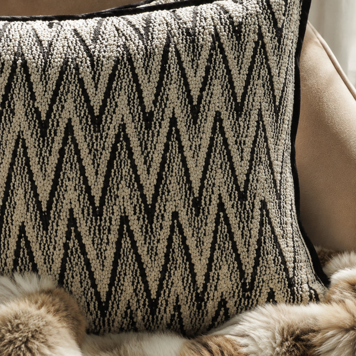 Black and white herringbone cushion close-up