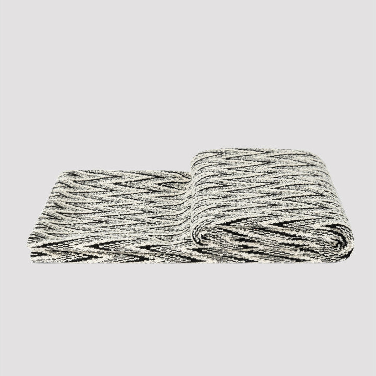 Black and white herringbone throw, folded