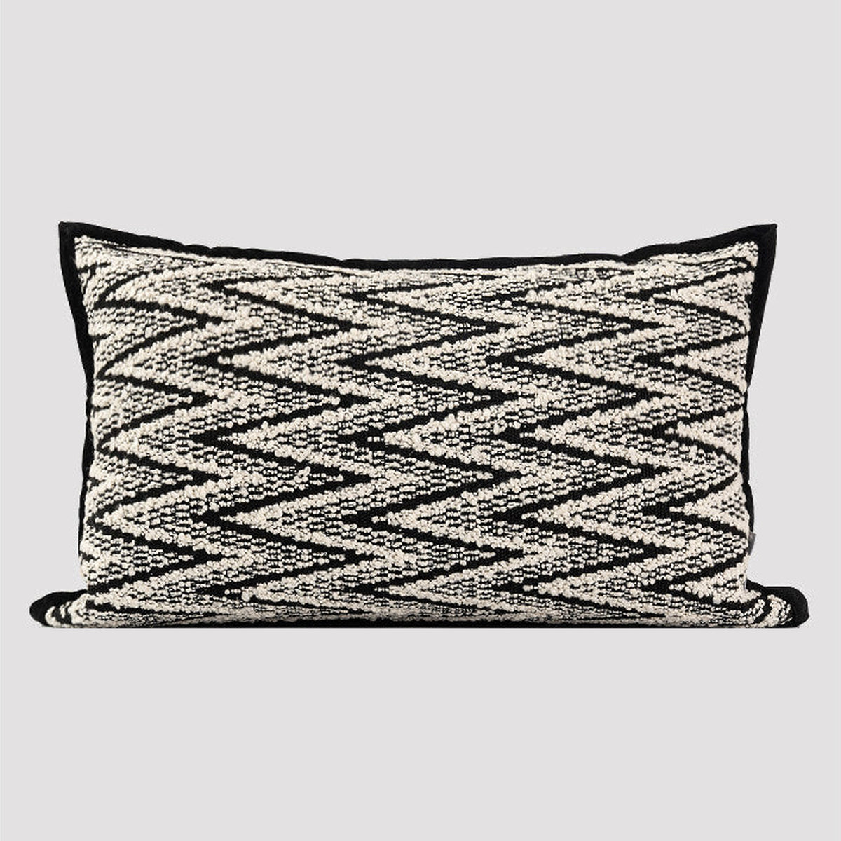 Black and white lumbar herringbone cushion