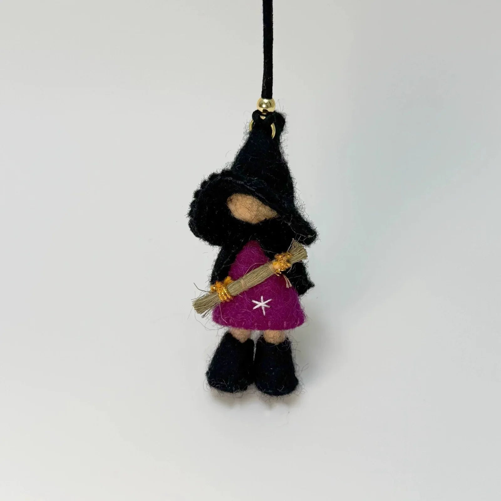 Black handmade wool felt witch bag charm with cord loop