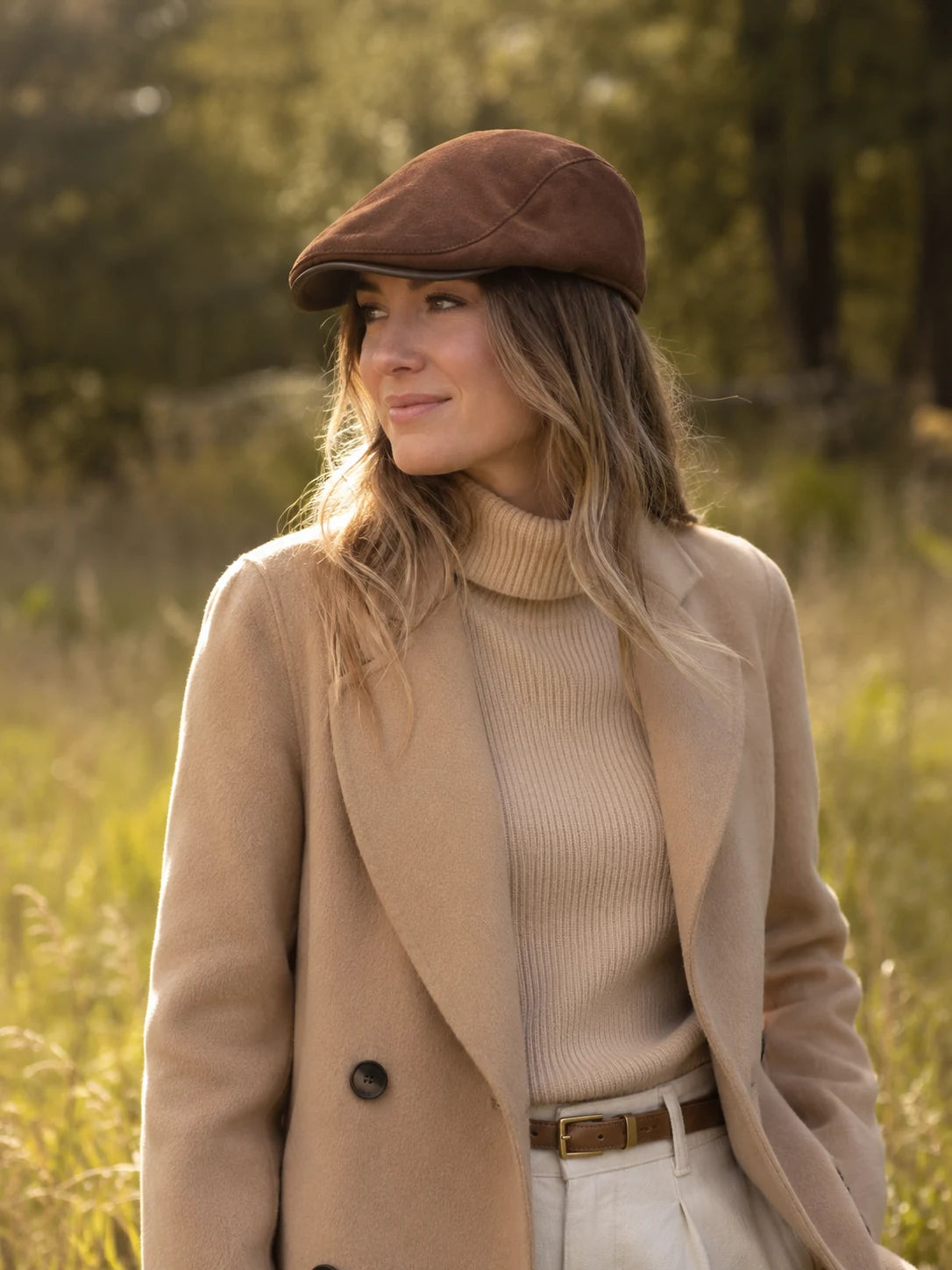 Woman wearing the Mocha Brown sheepskin leather newsboy cap with an autumn outfit