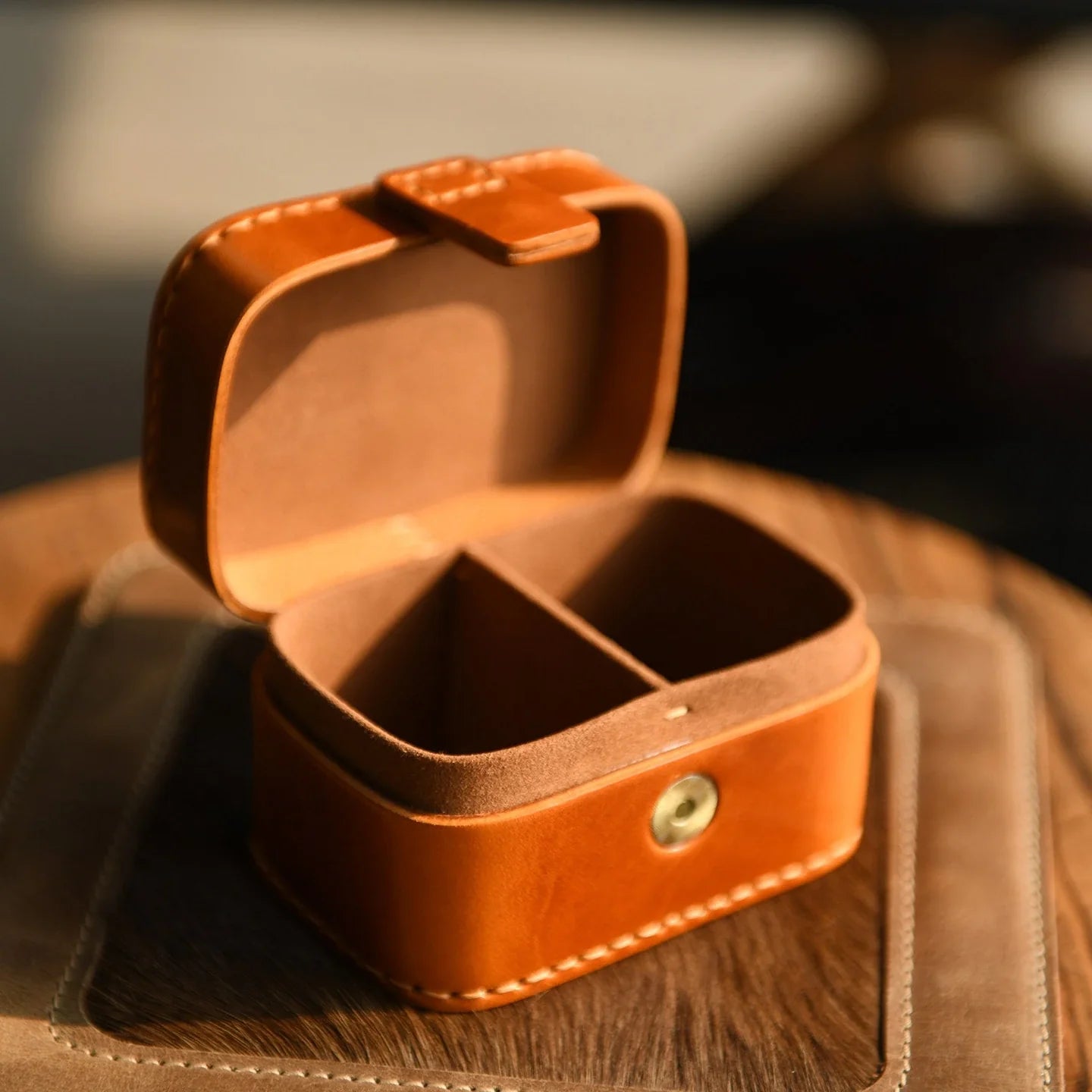 Open cowhide jewelry box with removable divider and magnetic closure