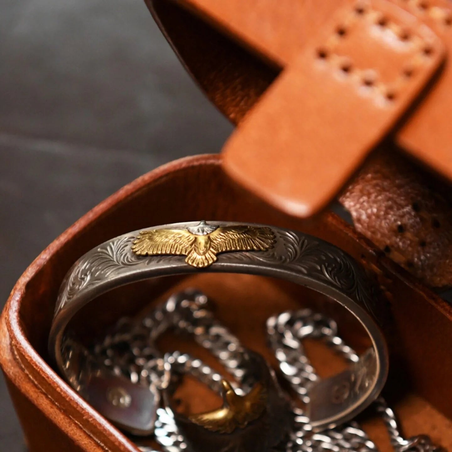 Cowhide box styled with rings, bracelet and necklace