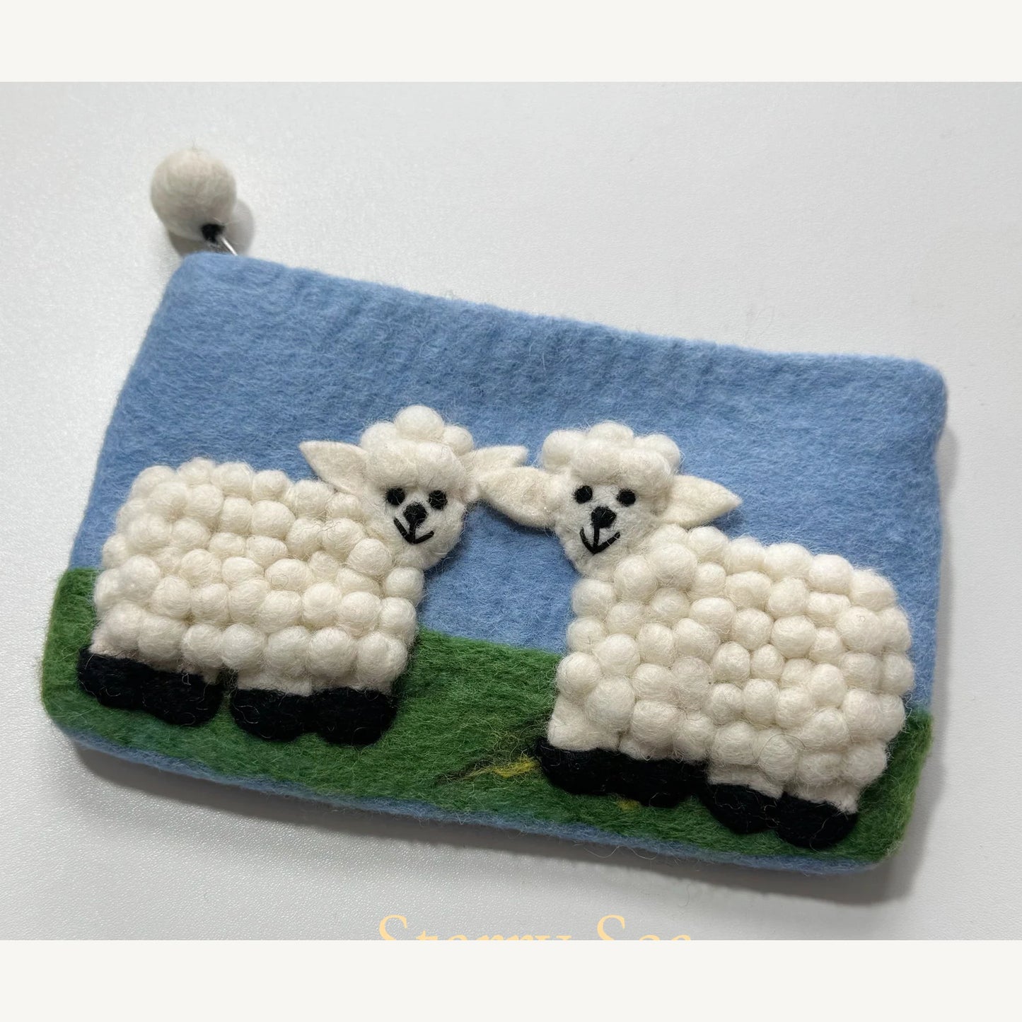 Handmade wool felt zip pouch — Light Blue — 20 × 12 cm