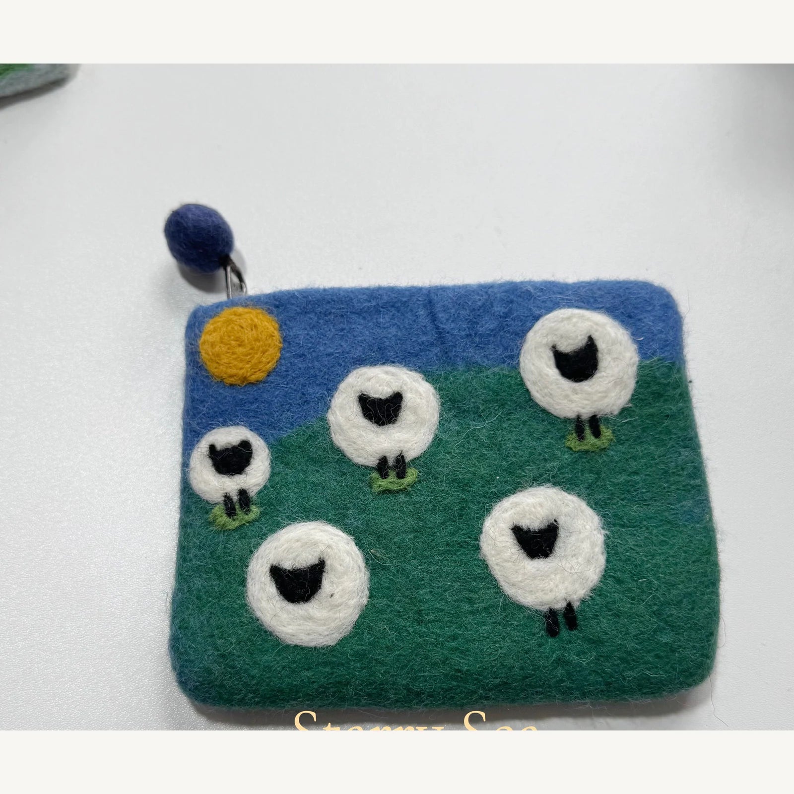 Handmade wool felt zip pouch — Five Black & White Sheep — 15 × 12 cm