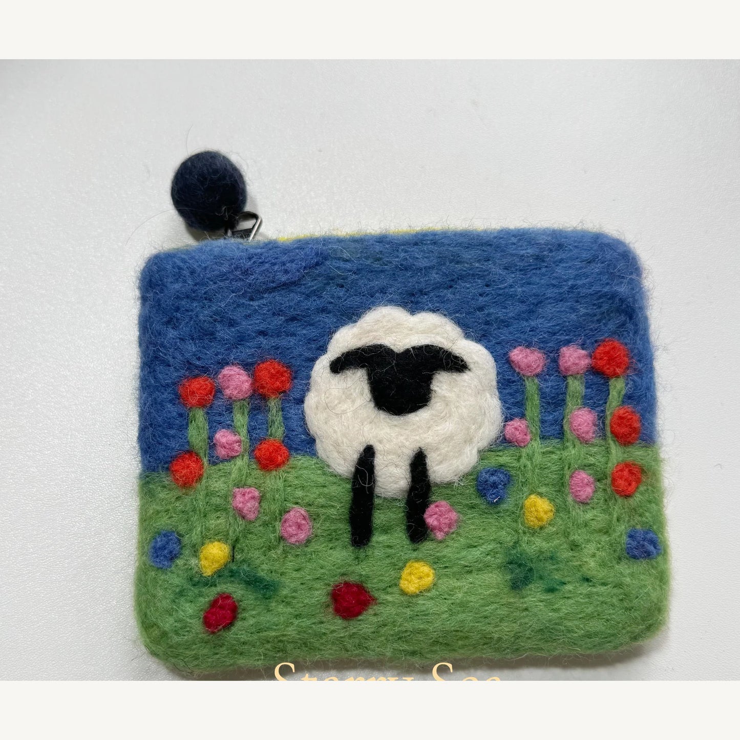 Handmade wool felt zip pouch — Meadow Black & White Sheep — 14 × 12 cm