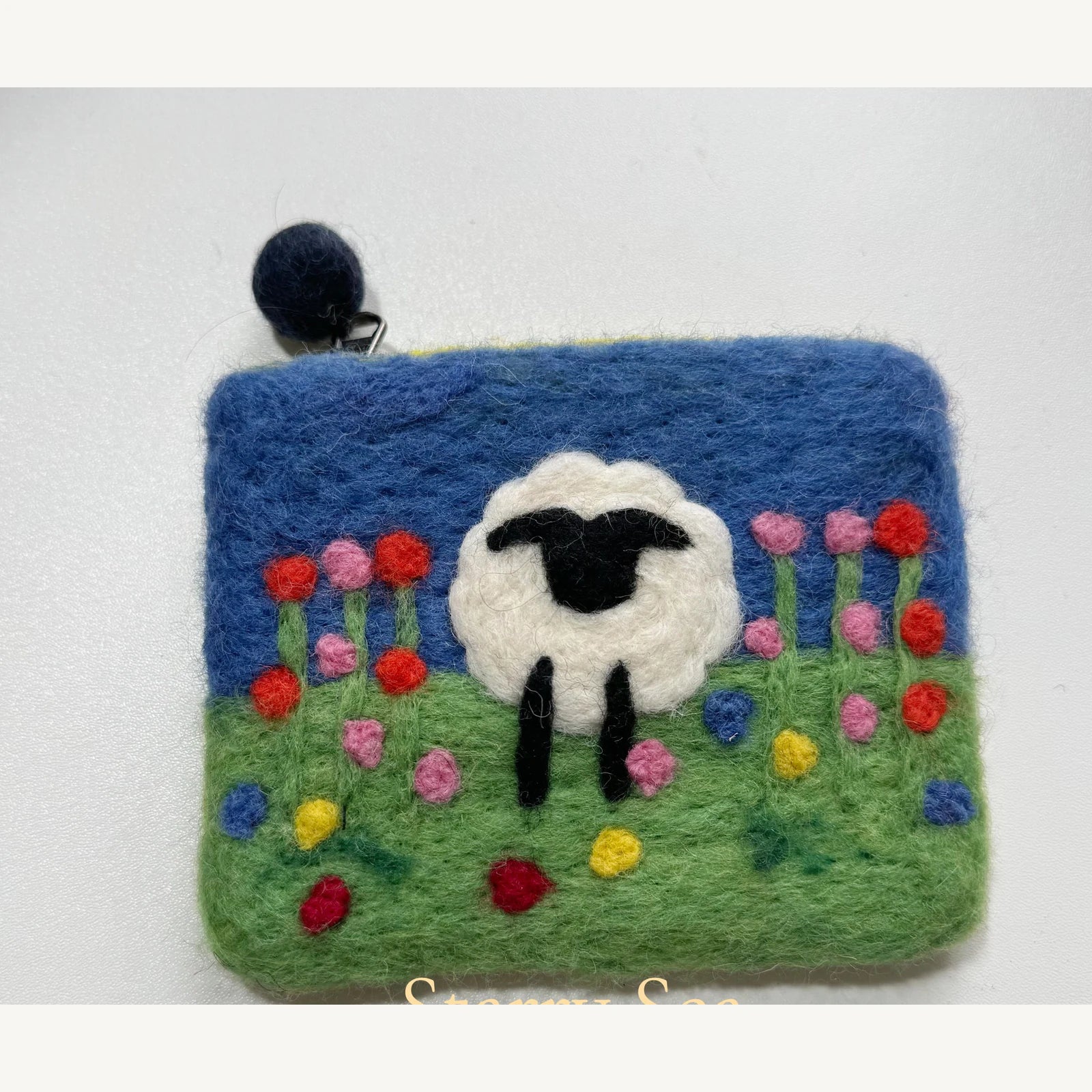 Handmade wool felt zip pouch — Meadow Black & White Sheep — 14 × 12 cm
