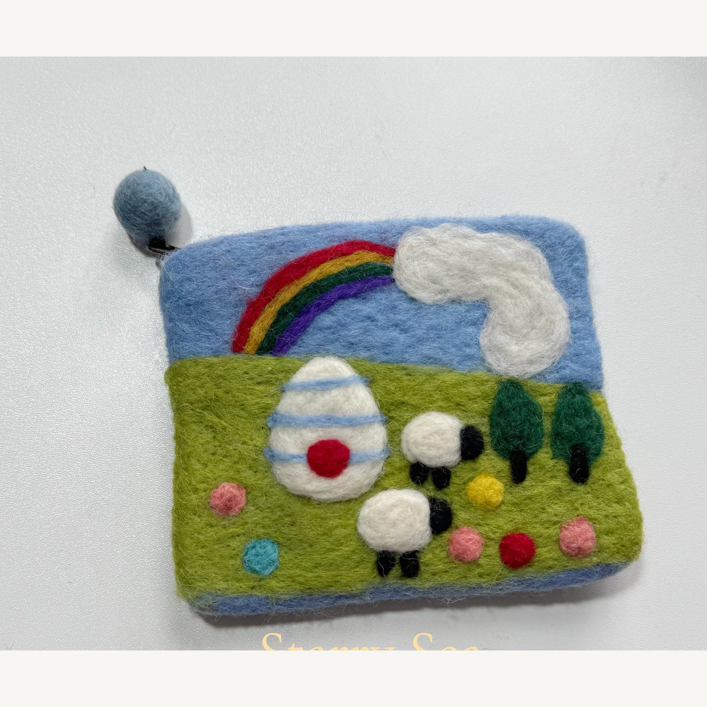 Handmade wool felt zip pouch — Rainbow — 14 × 11 cm