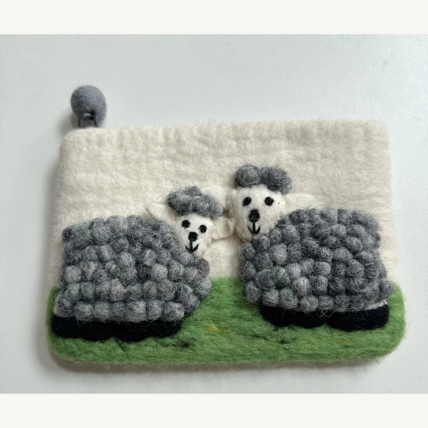 Handmade wool felt zip pouch — Grey Sheep / Ivory — 20 × 12 cm
