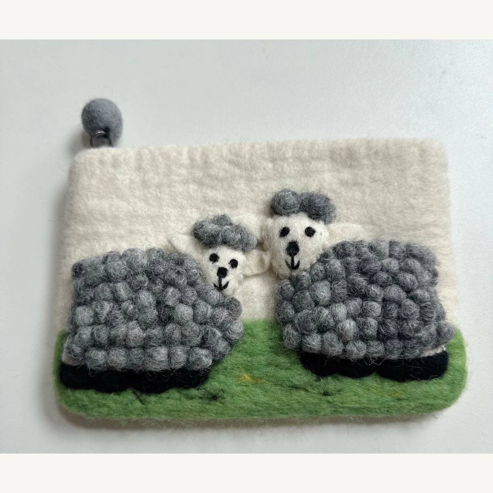 Handmade wool felt zip pouch — Grey Sheep / Ivory — 20 × 12 cm