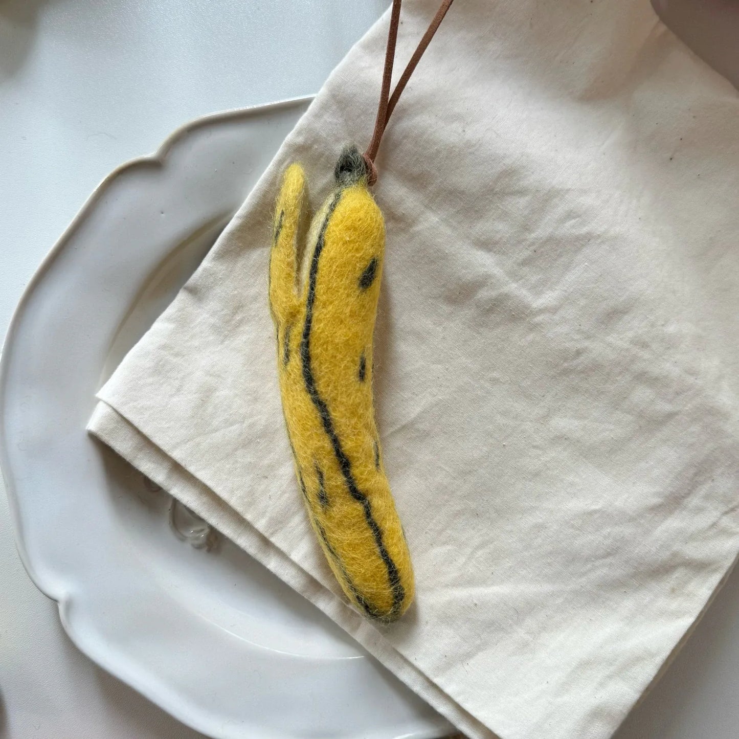Peeled banana wool felt hanging charm