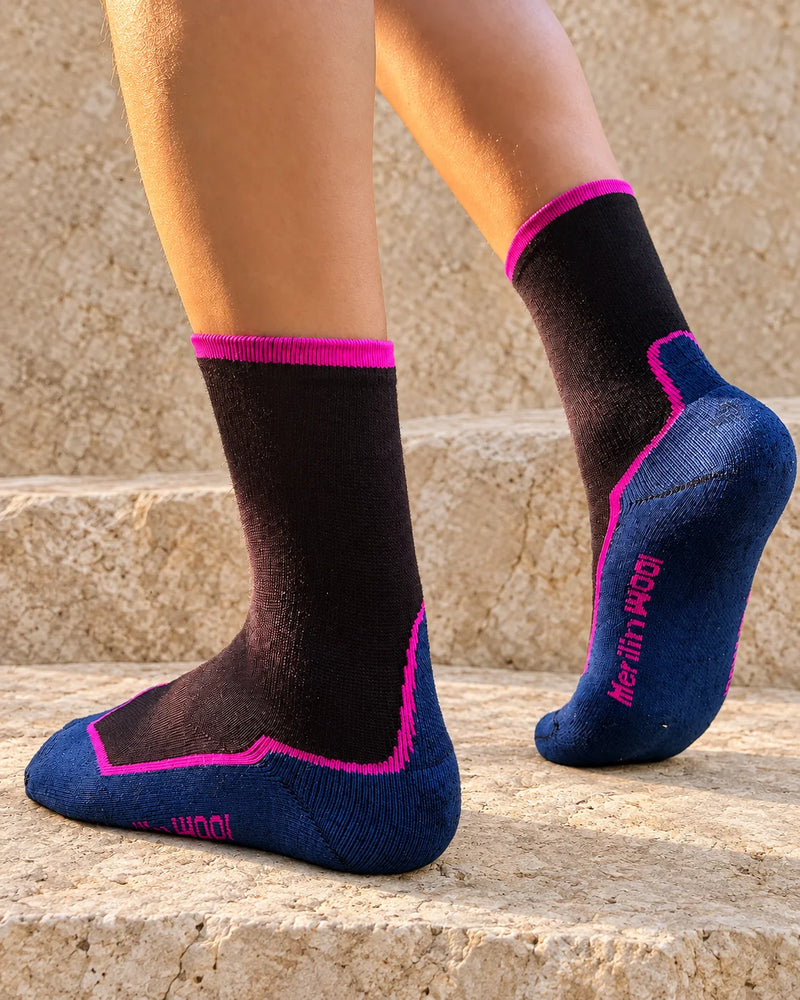 Merino Wool Blend Hiking Socks with Crew Coverage worn by an adult model