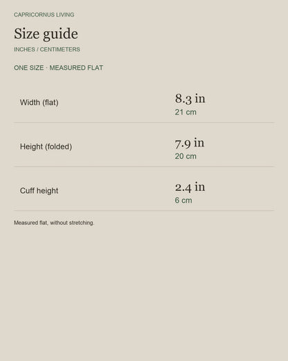 English size guide for Merino Wool Cuffed Beanie for Trail and Travel, with centimeter and inch measurements