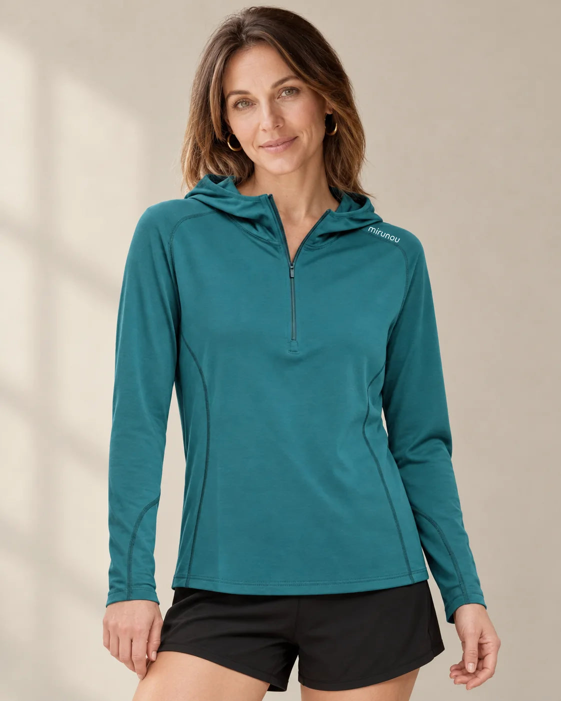 Merino Wool Half-Zip Hoodie for Trail and Travel worn by an adult model