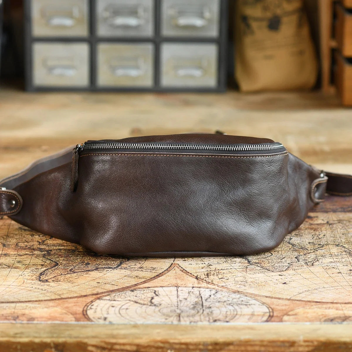 Coffee brown vegetable-tanned leather sling bag