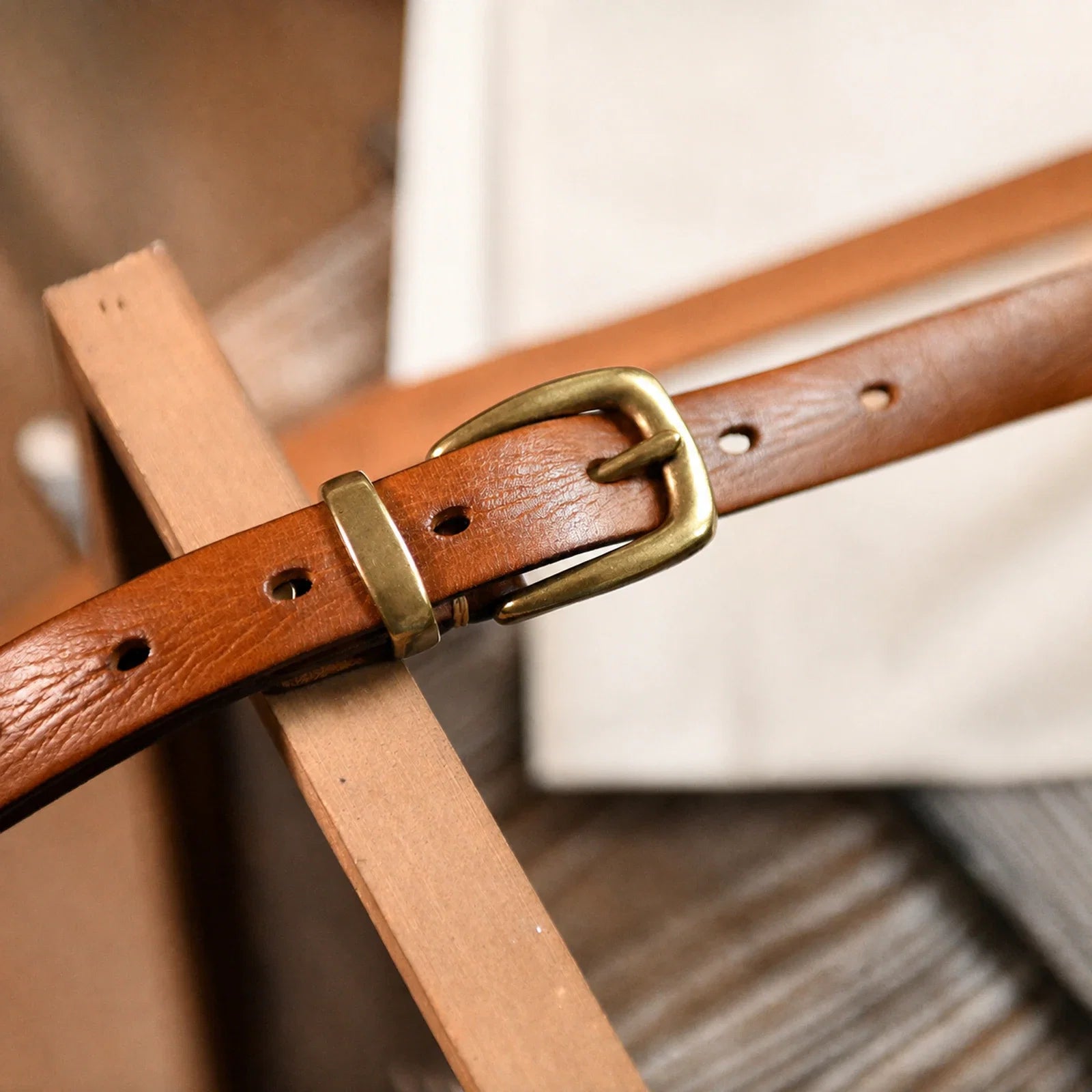 Cognac cow leather belt with copper single-prong buckle