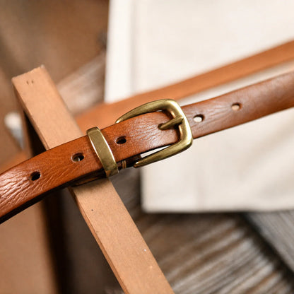 Cognac cow leather belt with copper single-prong buckle