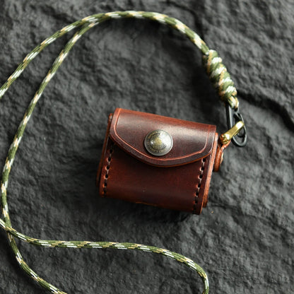 Deep Brown cowhide earbud case with sun medallion and neck cord
