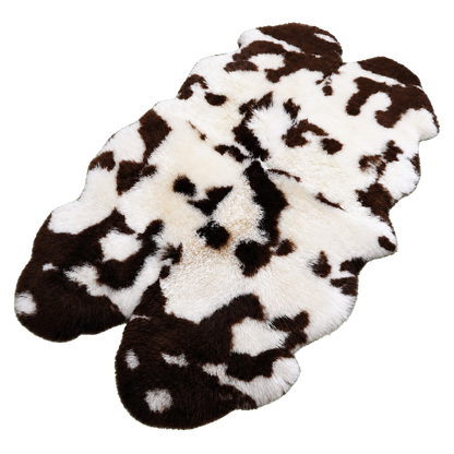 Natural Brown & Ivory genuine Australian long-wool multi-pelt sheepskin area rug on transparent background