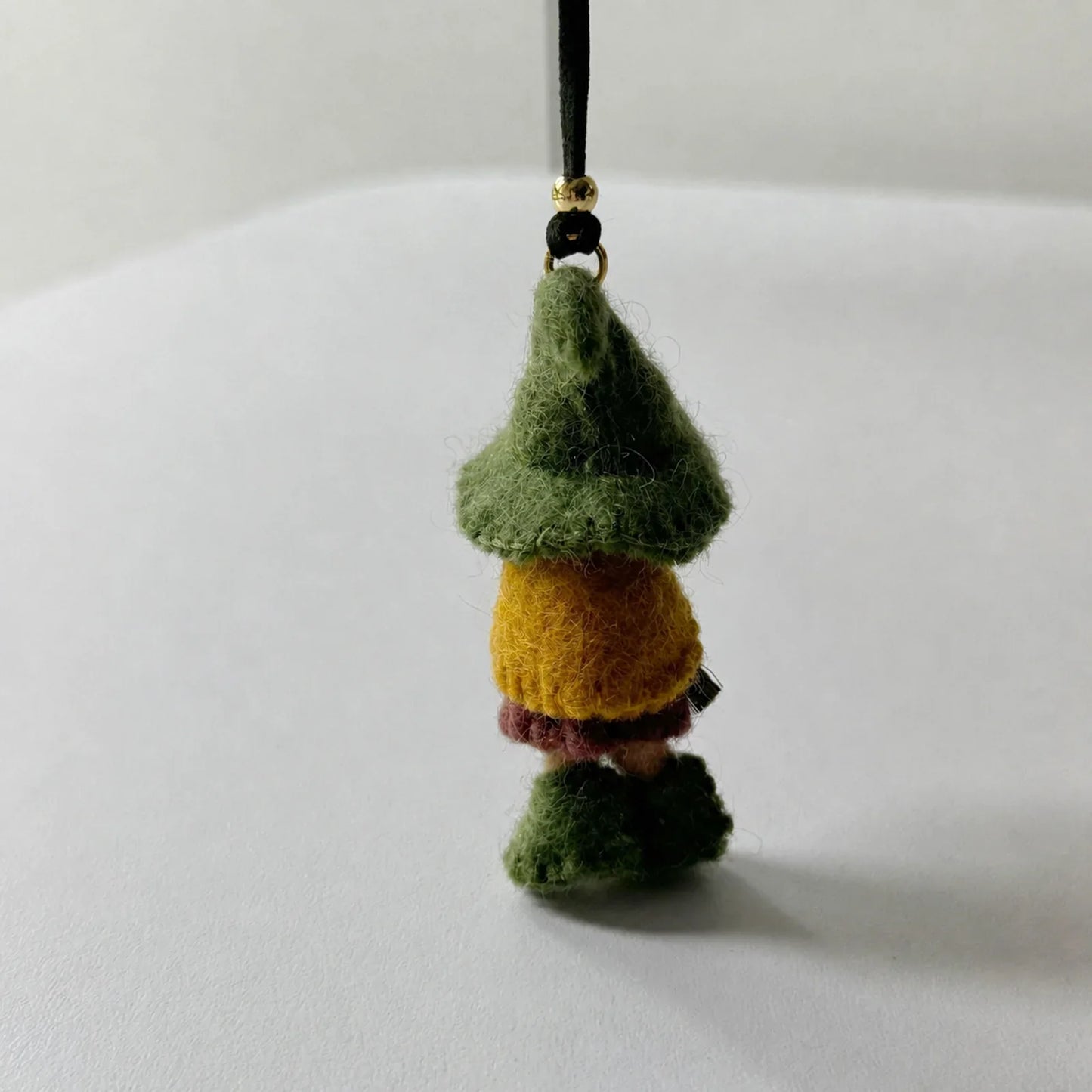 Green wool felt witch ornament back view