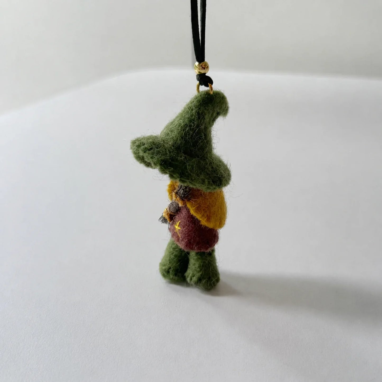 Green wool felt witch ornament side view