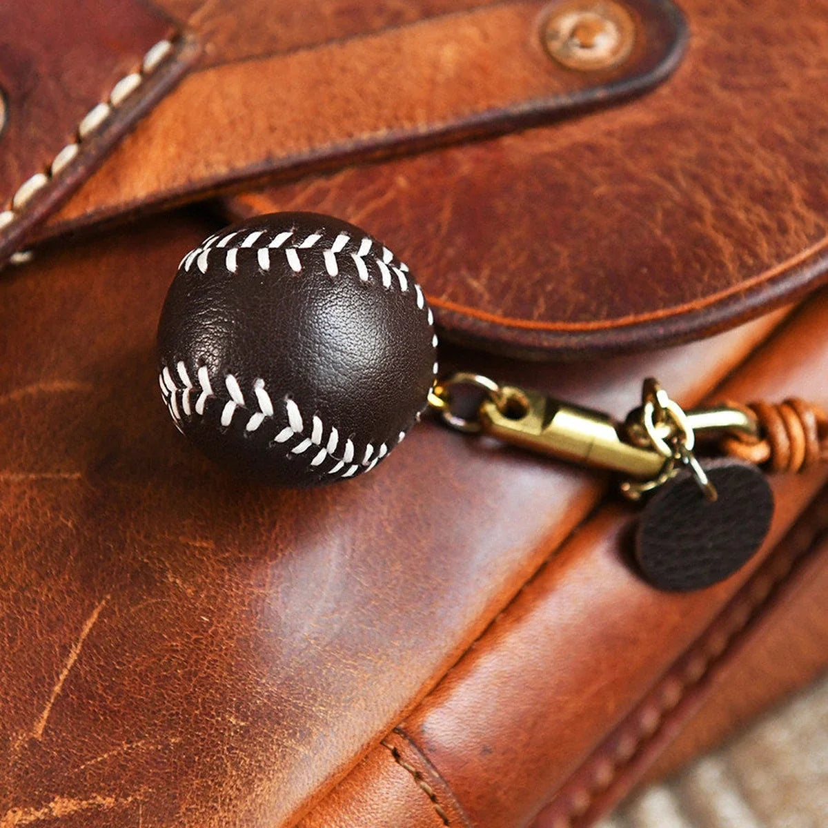 Close-up of baseball stitching and swivel clasp