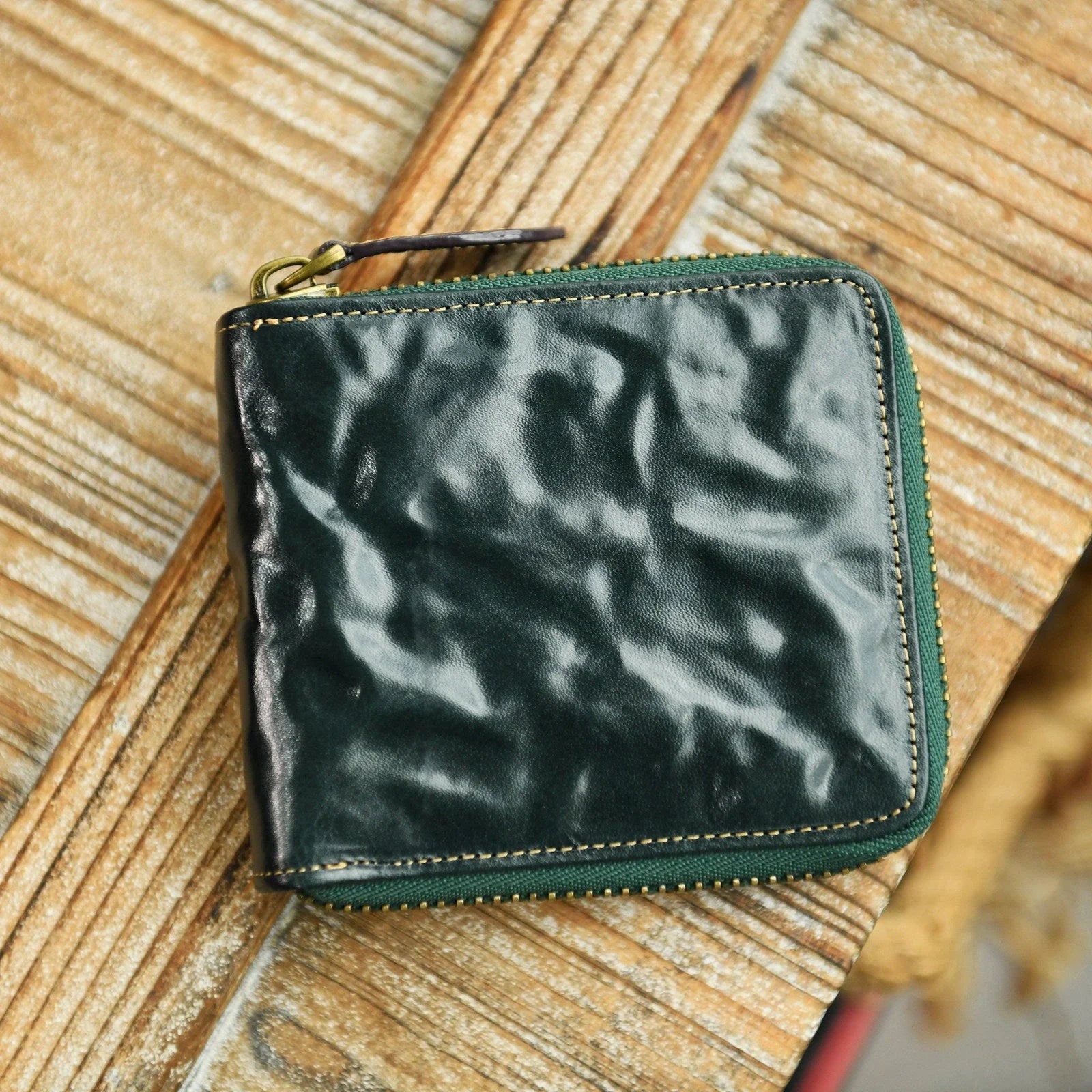 Forest Green top-grain cowhide zip-around wallet with hand-creased texture