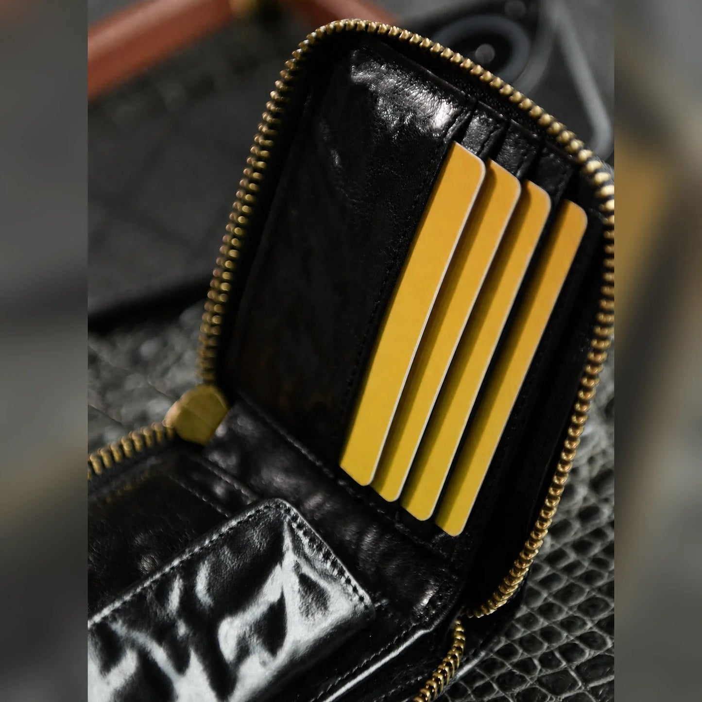 Interior card slots of the black top-grain cowhide zip-around wallet