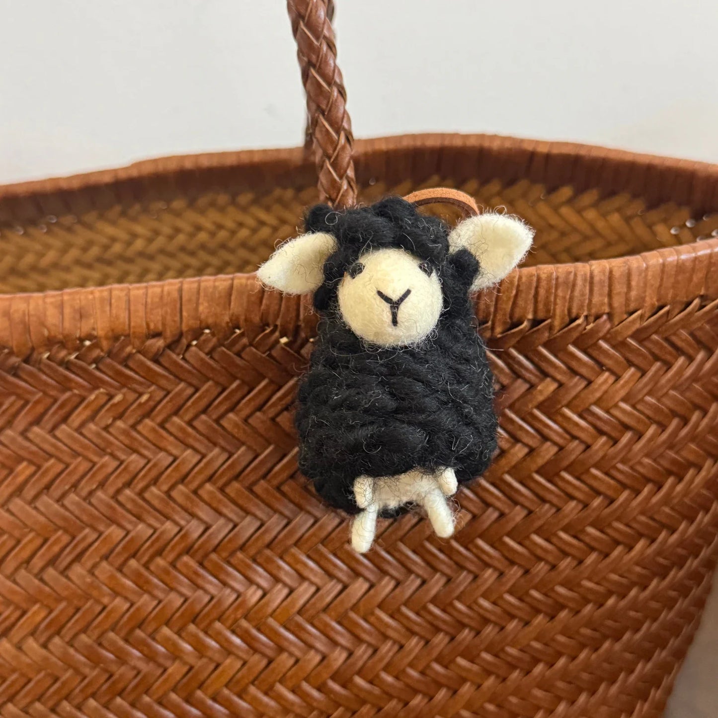 Black wool felt sheep bag charm with cream face