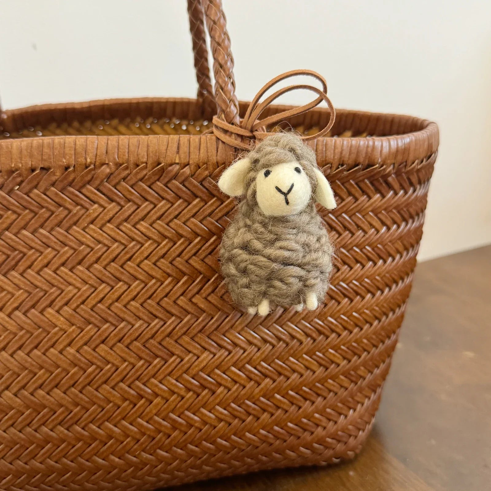 Brown wool felt sheep bag charm with leather cord