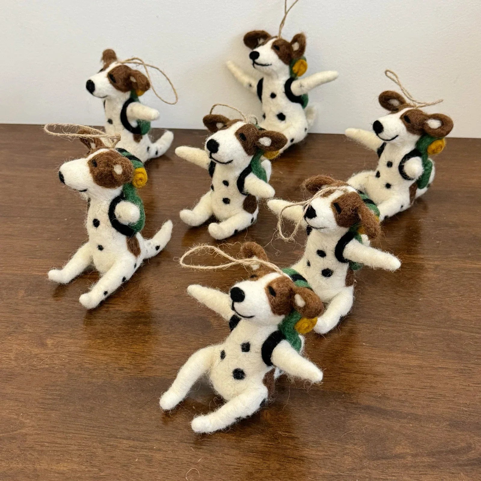 Handmade Dalmatian wool felt charms showing natural variation