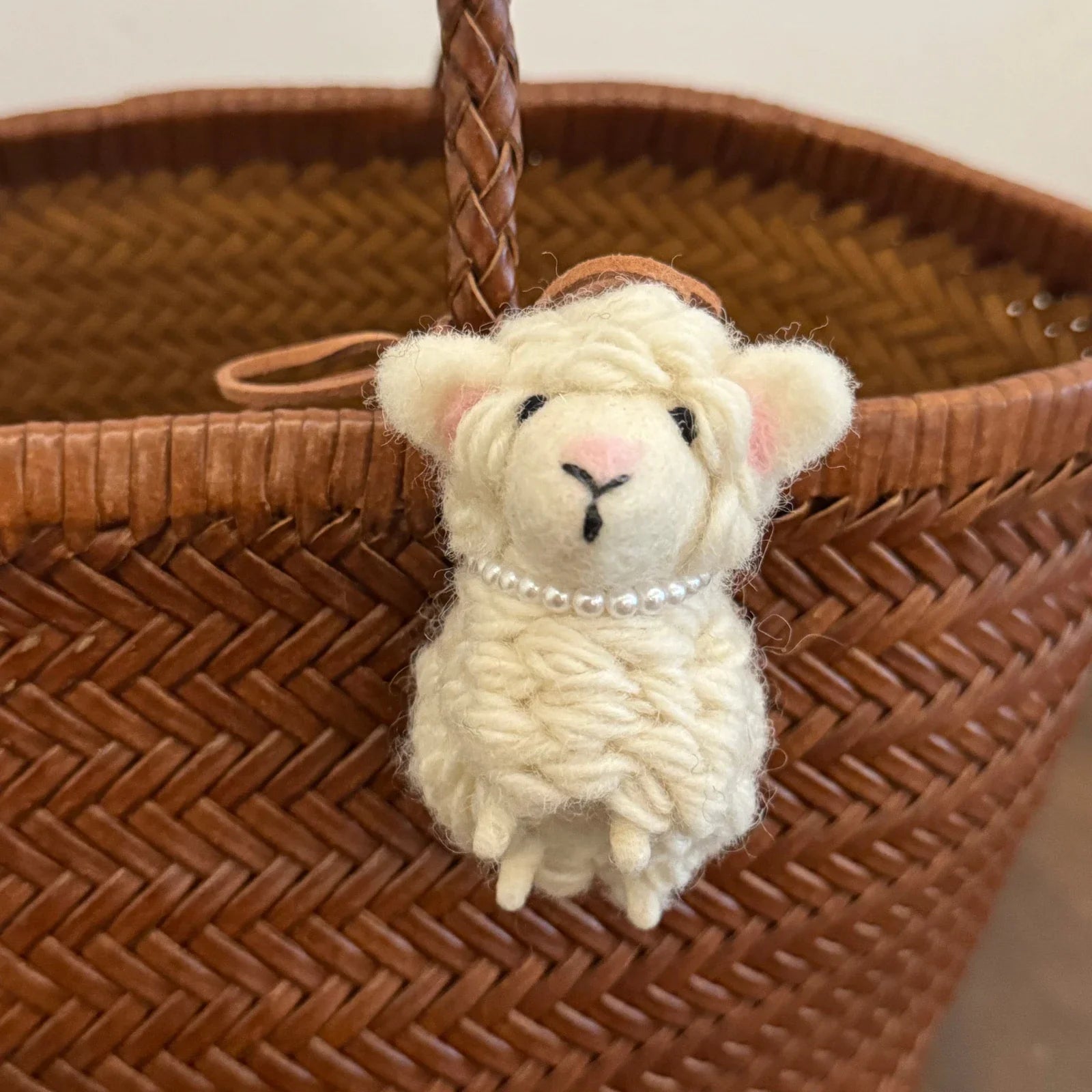 Cream wool felt sheep charm with pink nose and removable pearl necklace