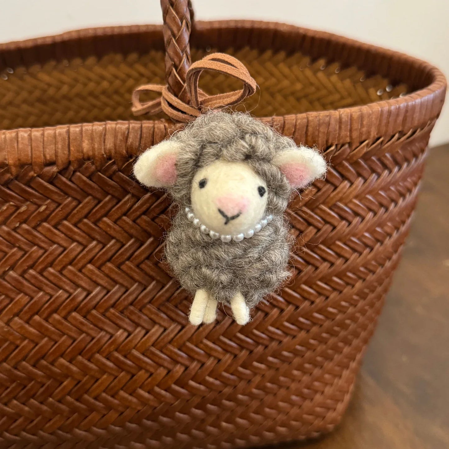Gray wool felt sheep charm with pink nose and removable pearl necklace