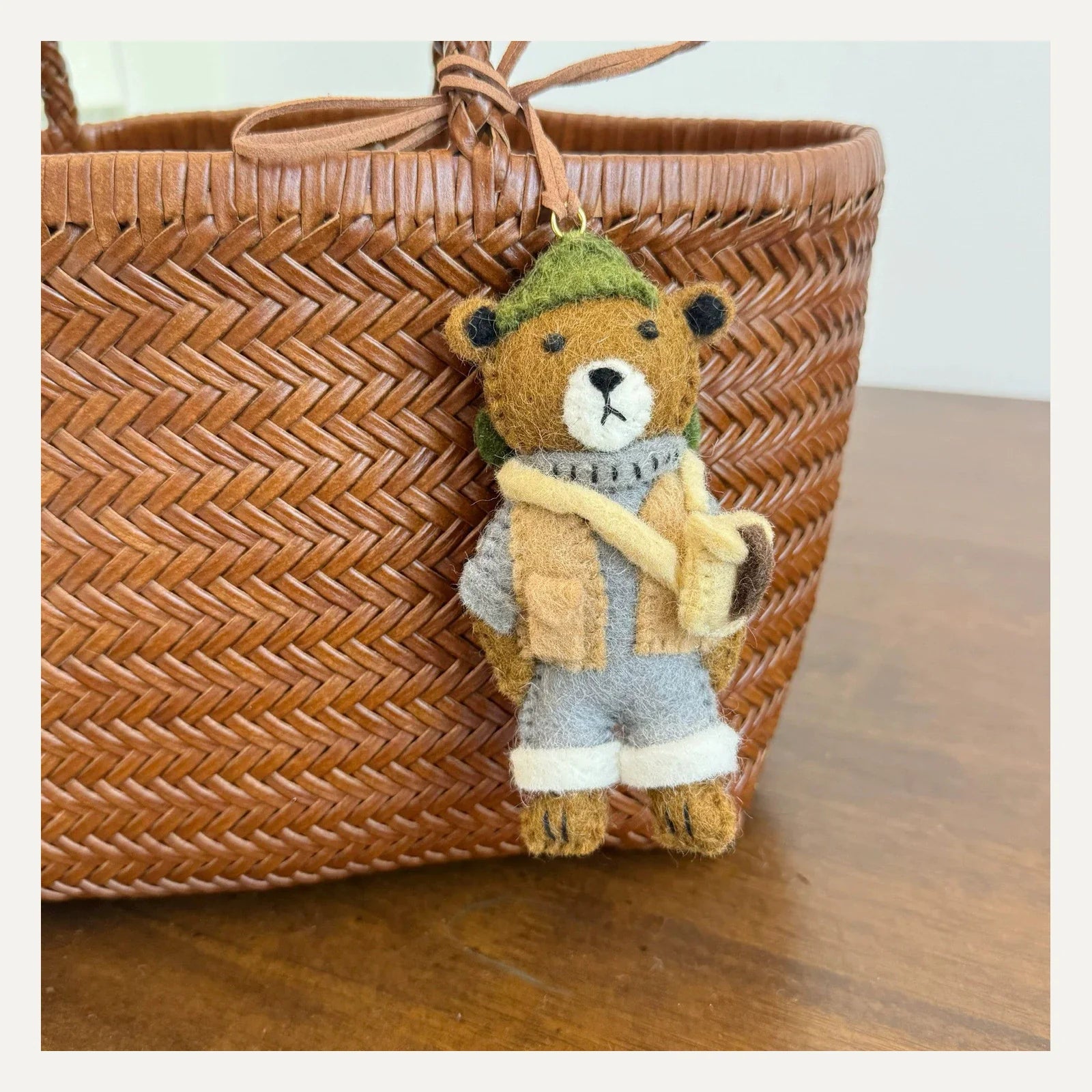 Handmade workwear bear wool felt bag charm with green cap and leather cord