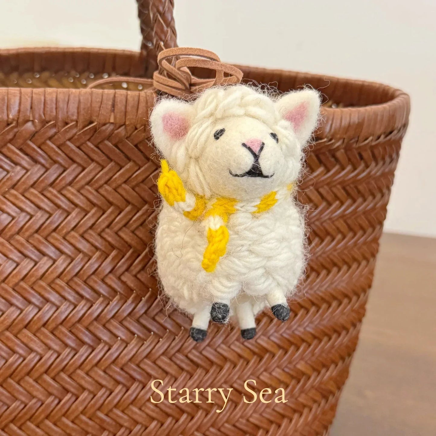 Cream wool felt sheep charm with yellow scarf