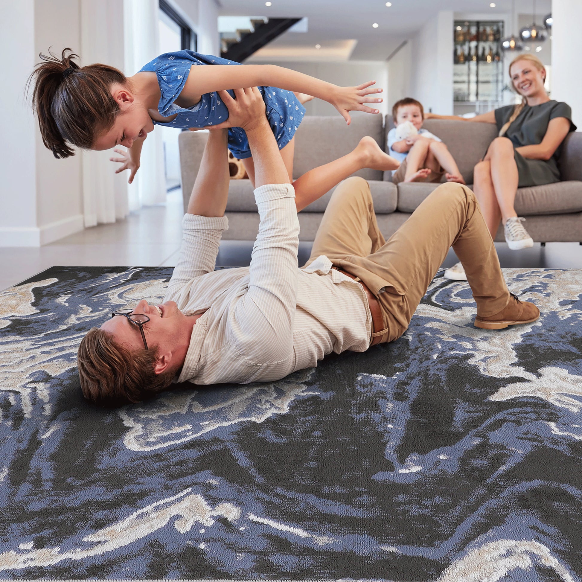 Loom & Luxe L.Blue & Abstract Area Rug