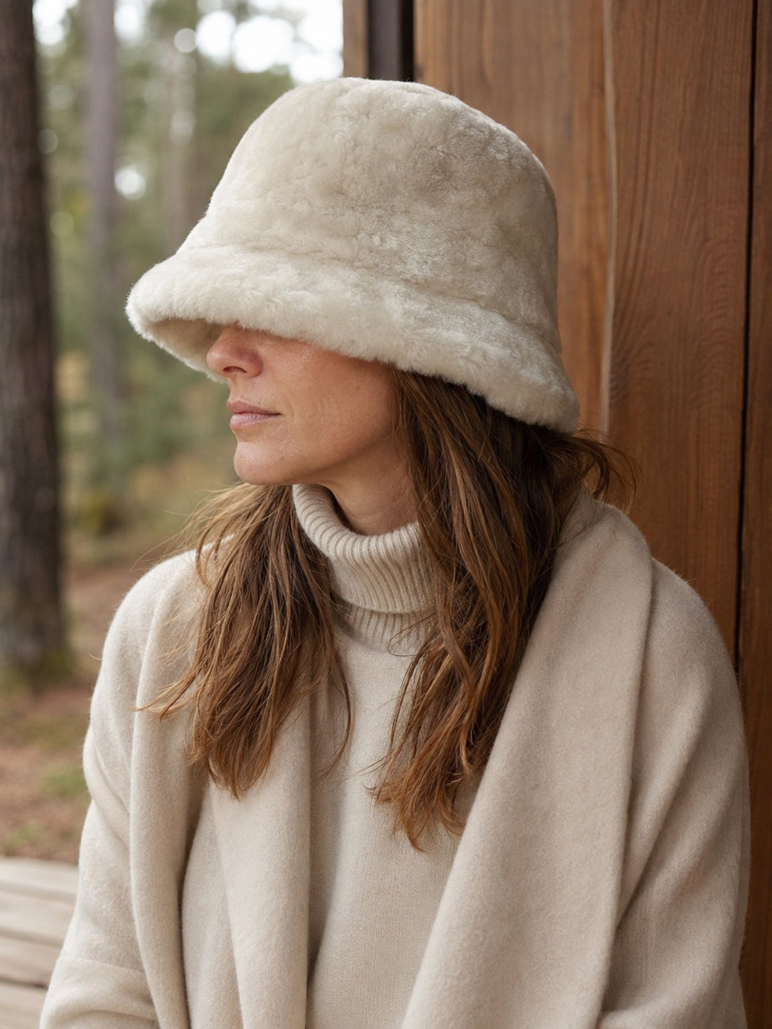 Person wearing an Off-White short-brim bucket hat at a cabin