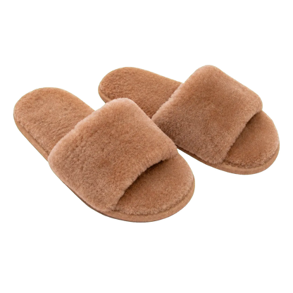 Capricornus Living Camel genuine Australian shearling slide slippers on a transparent background