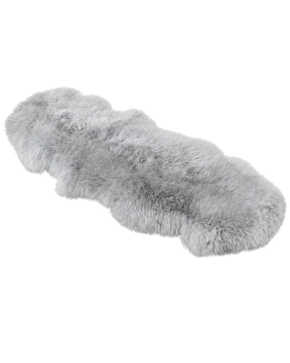 Capricornus Living Silver Gray genuine sheepskin sofa runner on a transparent background