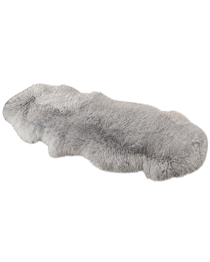 Capricornus Living Frosted Gray Tips genuine sheepskin sofa runner with naturally varying tipped pattern on a transparent background