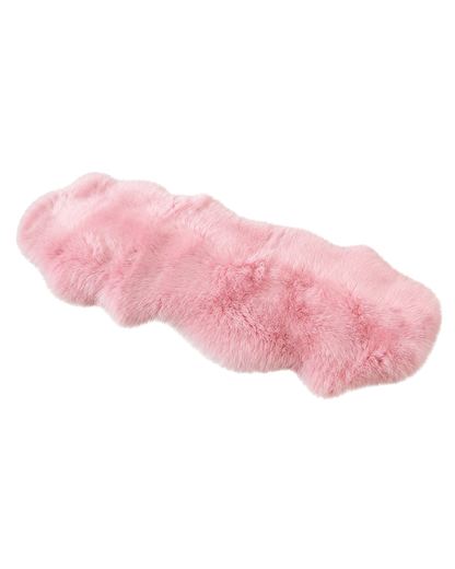 Capricornus Living Blush Pink genuine sheepskin sofa runner on a transparent background