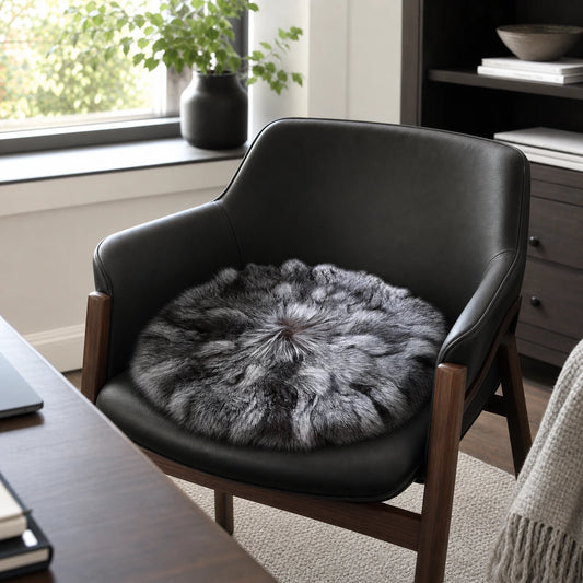 Capricornus Living Silver Fox round natural fur cushion in a contemporary American home office