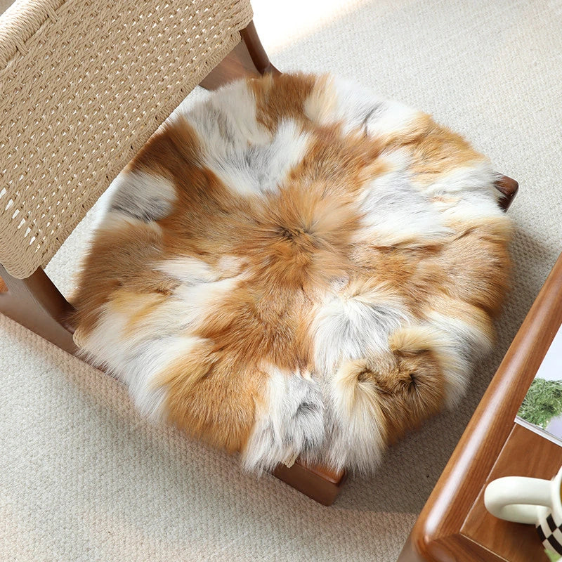 Capricornus Living Sun Fox genuine natural fur cushion fitted to a wood dining chair