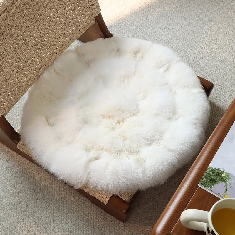Capricornus Living White Fox genuine natural fur cushion fitted to a wood dining chair
