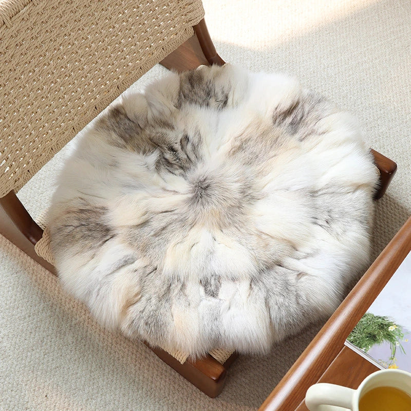 Capricornus Living Golden Island Fox genuine natural fur cushion fitted to a wood dining chair