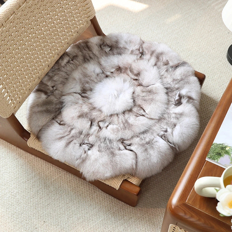 Capricornus Living Blue Fox genuine natural fur cushion fitted to a wood dining chair